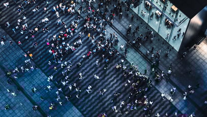 Aerial View of Crowded Pedestrians Walking on the Business Street at Night 