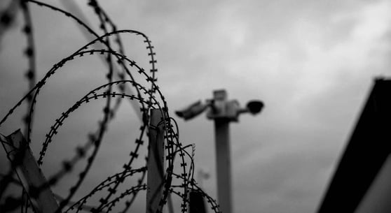 Barbed Wire Fence and security camera