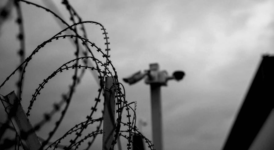 Barbed Wire Fence and security camera