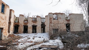 Post-war landscape. Destroyed building. War ruins. Destroyed city after the bombing. Dead city. Bombed buildings. Debris buildings. War destruction. Ukraine