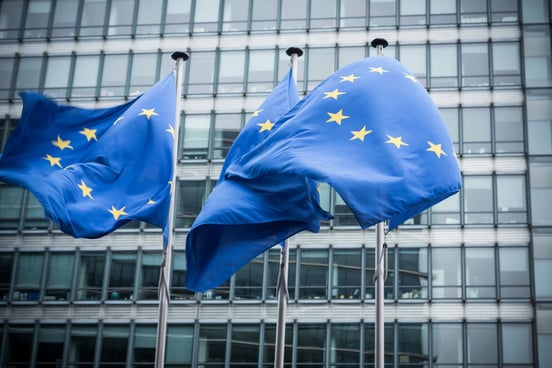 European Union flags blowing in the wind