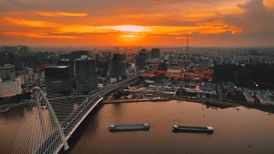 Sunset over city and river